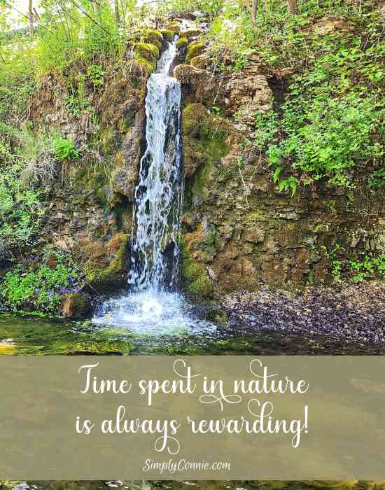 An image quote reading: Time spent in nature is always rewarding. The image is the waterfall at Paradise Cove.