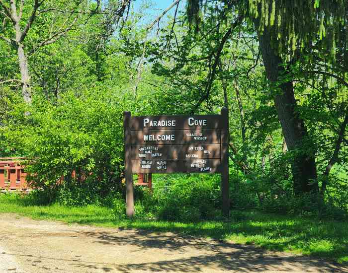 The welcome to Paradise Cove sign.